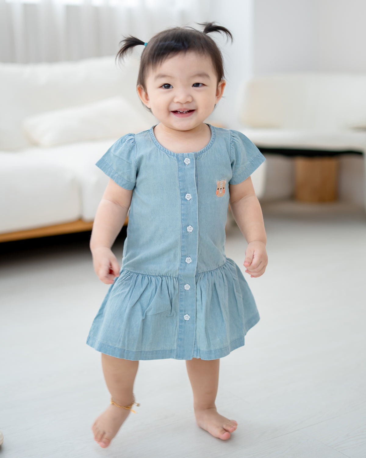 Toddler girl wearing LeBear soft light blue denim dress in Singapore