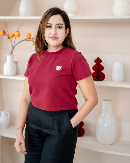 Close-up of LEBEAR Women’s Red Crop Tee – festive premium cotton apparel