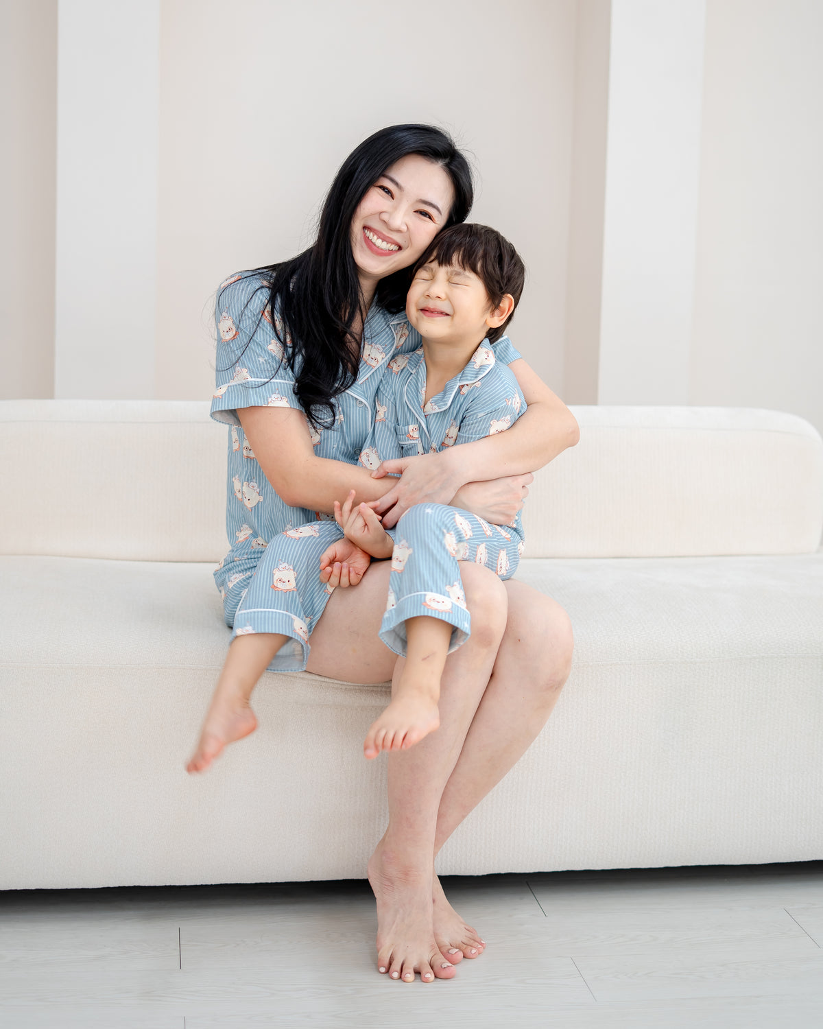 Matching Little Dreamer bamboo pyjamas in aqua blue for mum and child