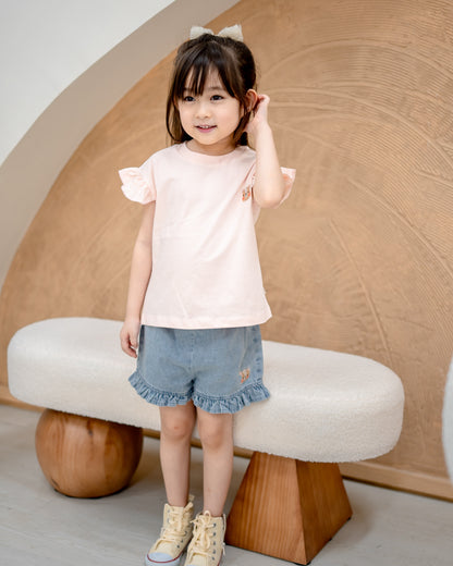 Children’s blush pink Odell cotton top with ruffle sleeves, lightweight breathable fabric for stylish kids clothing