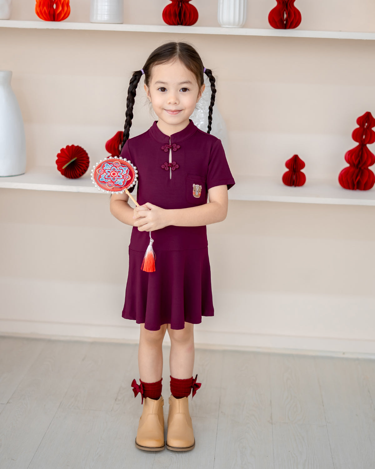 Front view of Plum Blossom Bamboo Cheongsam with knot buttons and twirl skirt