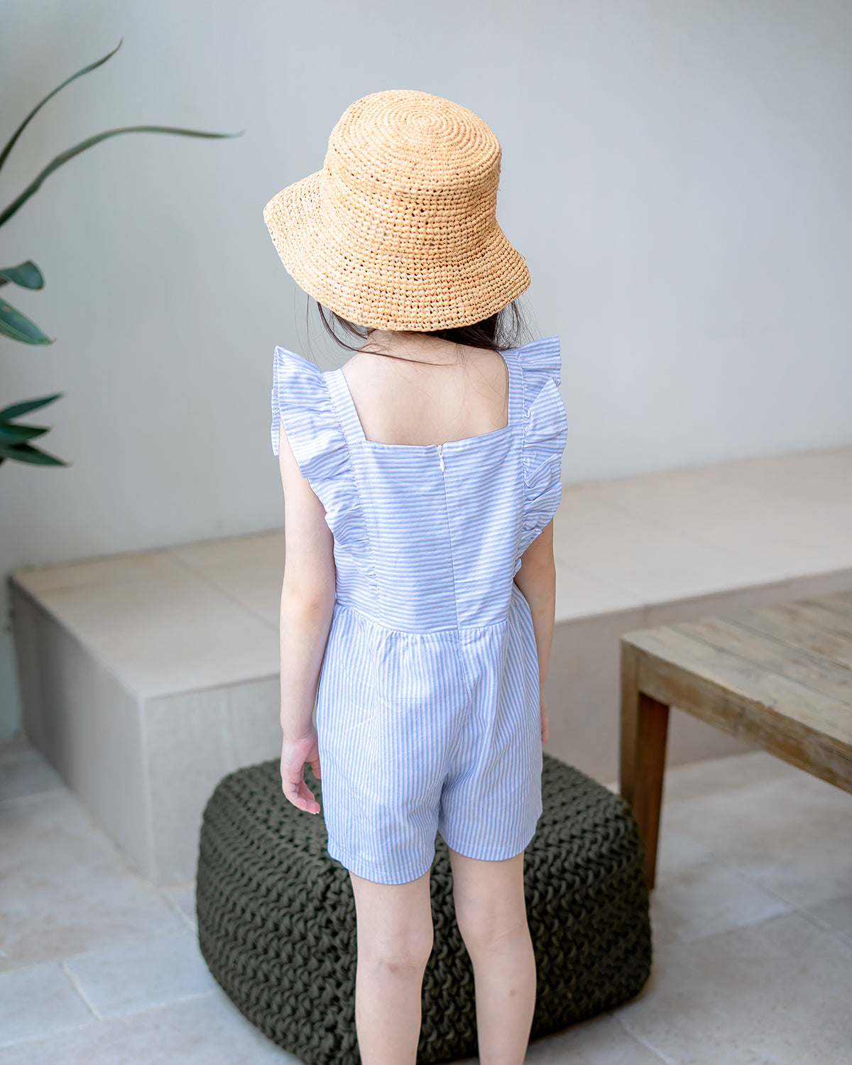 Back view of LeBear Wander & Wonder Kids Stripe Playsuit in Sky Blue.