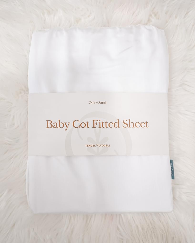 Oak and Sand Baby Cot Sheet in Cloudy Warm White